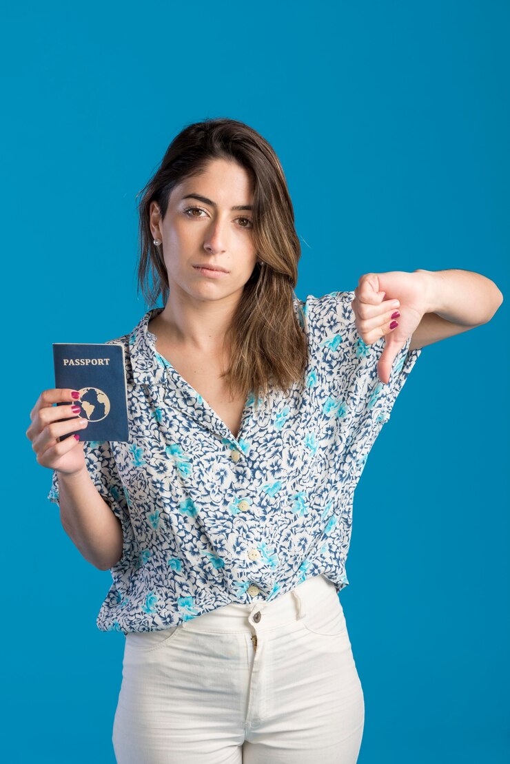 Free Photo medium shot woman holding passport