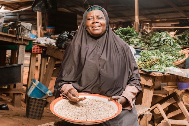 Medium shot woman holding plate