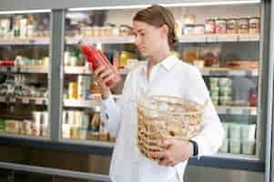 Free photo medium shot woman holding product