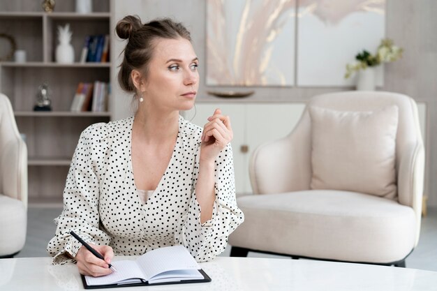 Medium shot woman at home