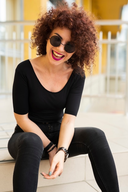 Free photo medium shot of woman laughing