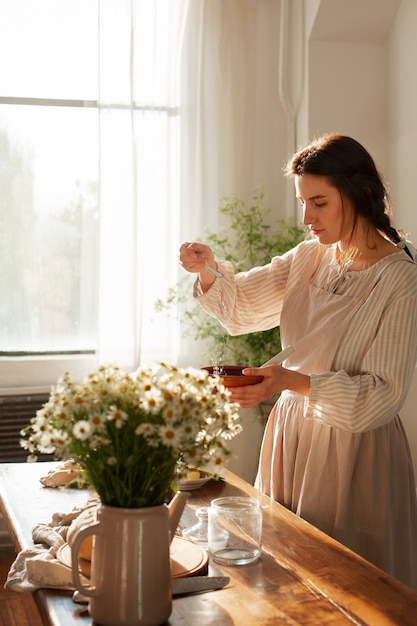medium shot woman living at farmhouse