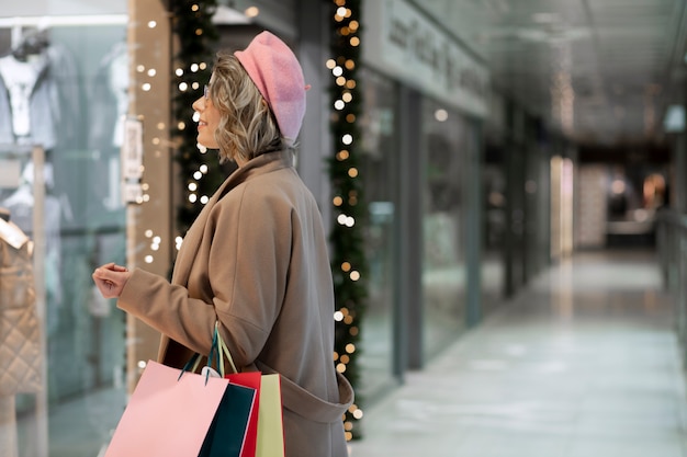 Medium shot woman at local retail shopping