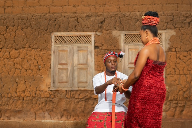 Medium shot woman and man wearing jewelry