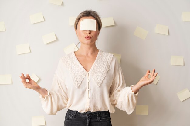 Free Photo medium shot woman meditation pose