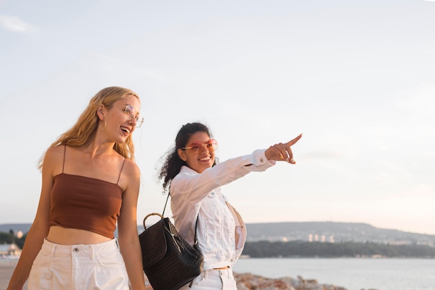 Medium shot woman pointing away