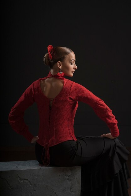 Medium shot woman posing on chair