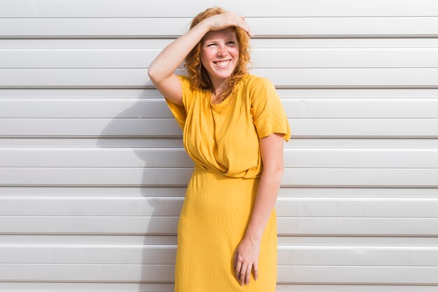 Medium shot woman posing in dress