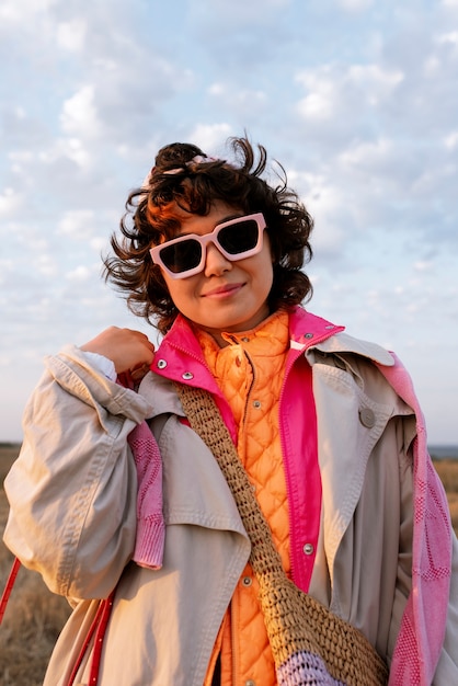 Medium shot woman posing fast fashion concept