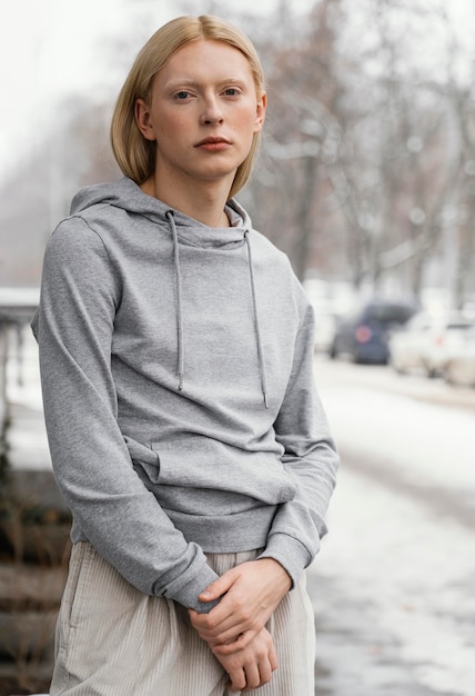 Medium shot woman posing outdoors