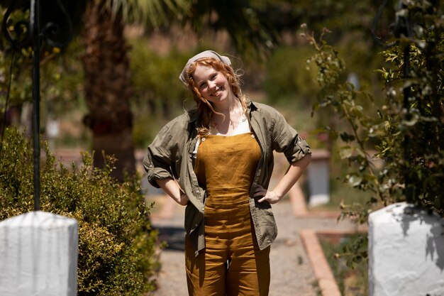 Medium shot woman posing outdoors