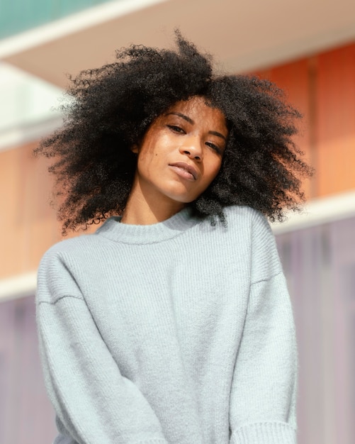 Free photo medium shot woman posing outside