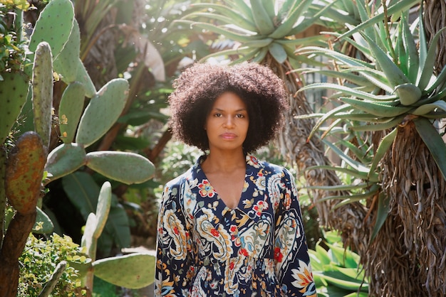 Medium shot woman posing in romantic garden