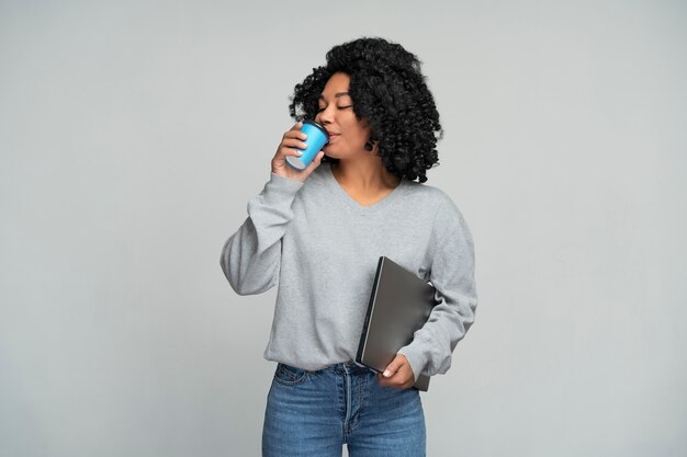 Medium shot woman posing in studio