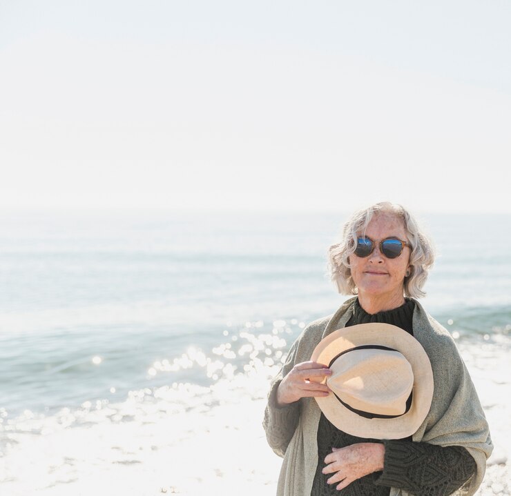 Free Photo medium shot woman posing with a hat