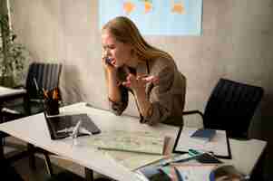 Free photo medium shot woman screaming on phone