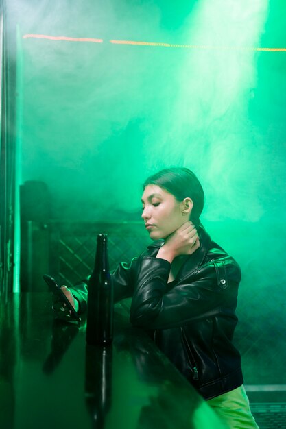 Medium shot woman sitting at bar