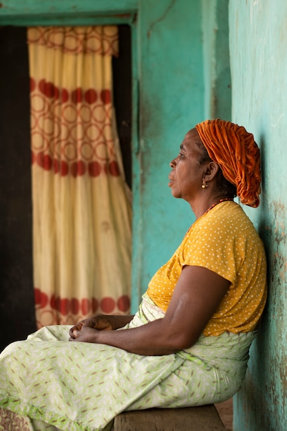 Medium shot woman sitting on bench