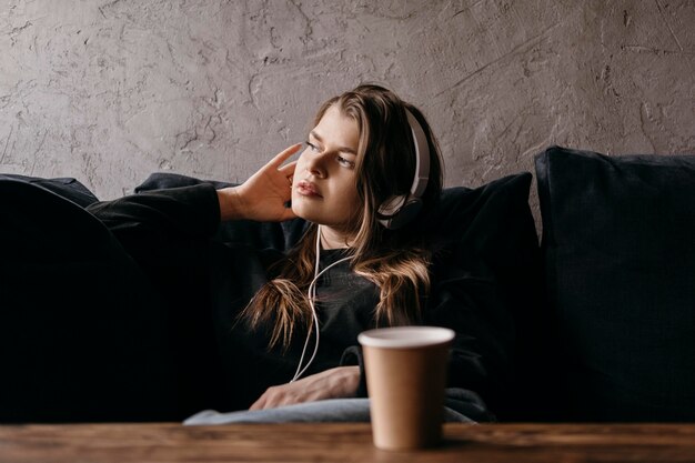 Free photo medium shot woman sitting at table