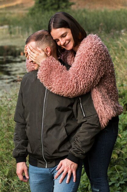 Medium shot woman surprising partner