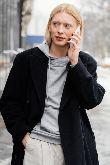 Medium shot woman  talking on phone