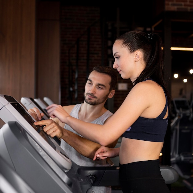 Medium shot woman on treadmill