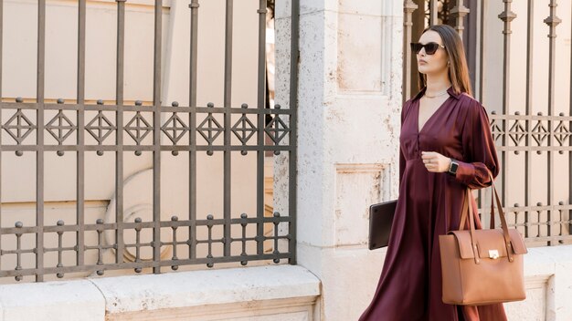 Medium shot woman walking outdoors