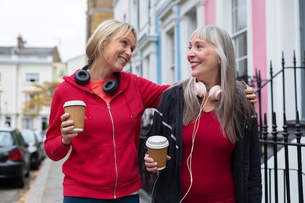 Medium shot woman walking together