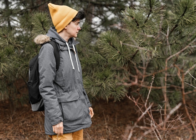 Medium shot woman wearing backpack