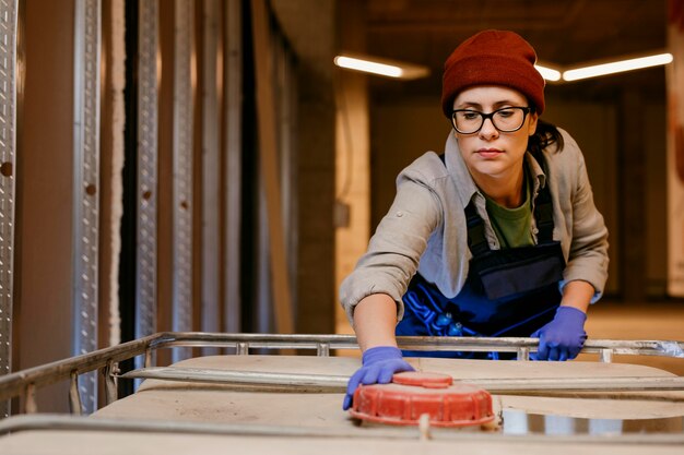 Medium shot woman wearing equipment