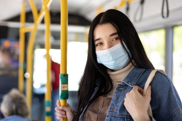 Medium shot woman wearing face mask