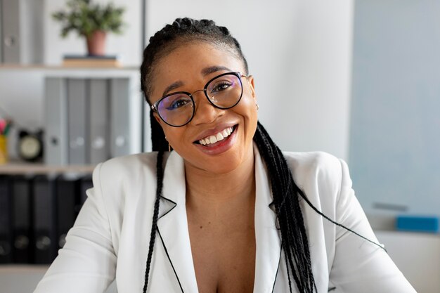 Medium shot woman wearing glasses