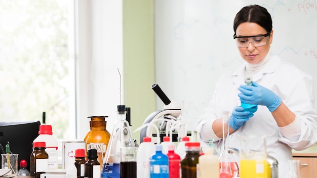 Medium shot woman wearing goggles