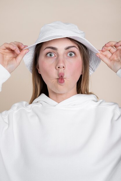 Medium shot woman wearing hat portrait