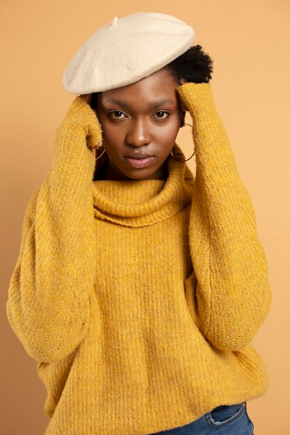 Medium shot woman wearing hat