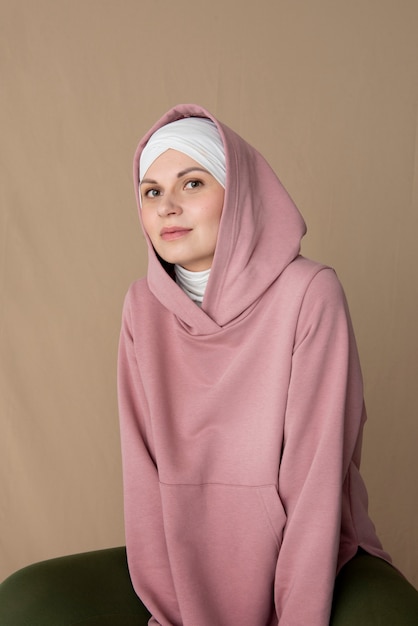 Medium shot woman wearing hijab