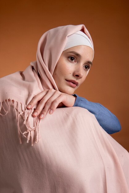 Medium shot woman wearing hijab