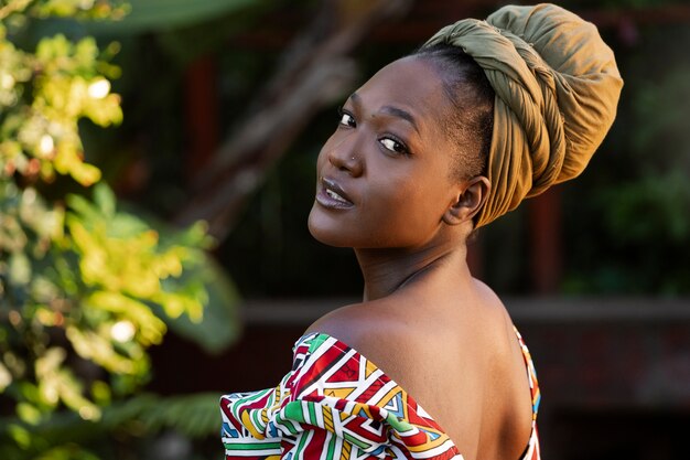 Medium shot woman wearing native attire