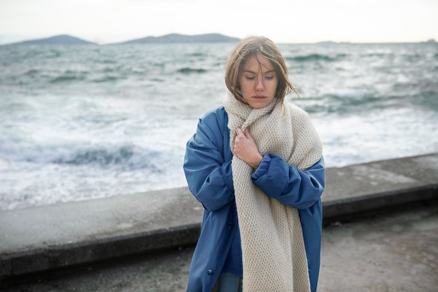 Medium shot woman wearing scarf