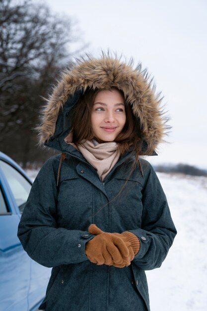 Medium shot woman wearing warm jacket