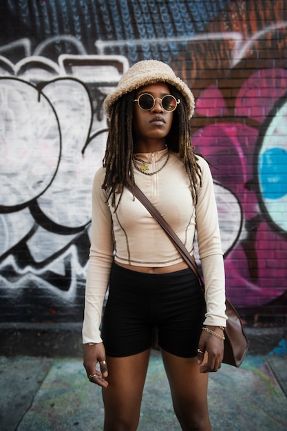 Medium shot woman with afro dreadlocks