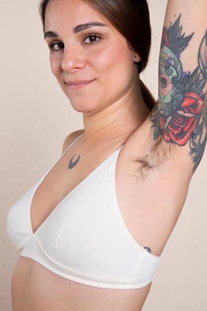 Medium shot woman with armpit hair