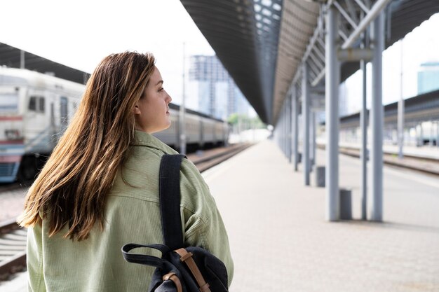 medium shot woman with backpack