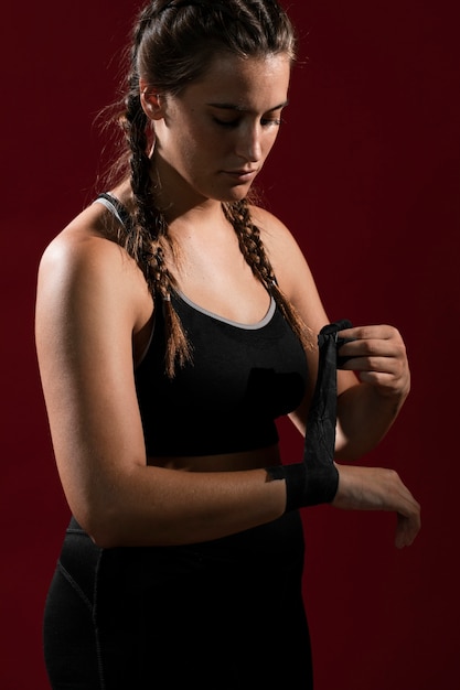 Free photo medium shot of woman with bandaged hands