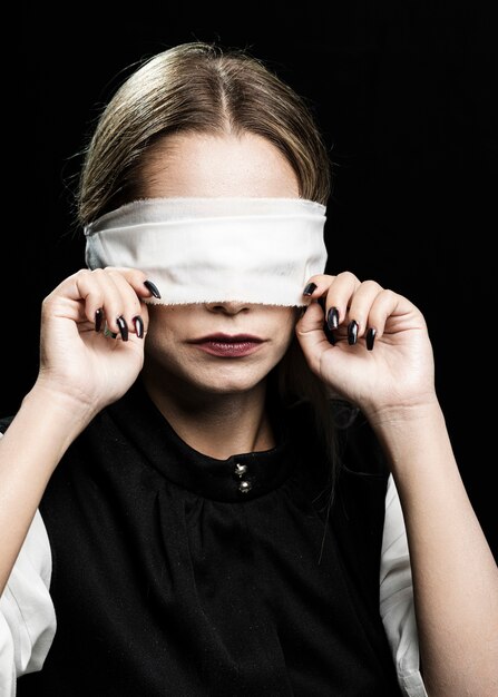 Medium shot of woman with blindfold