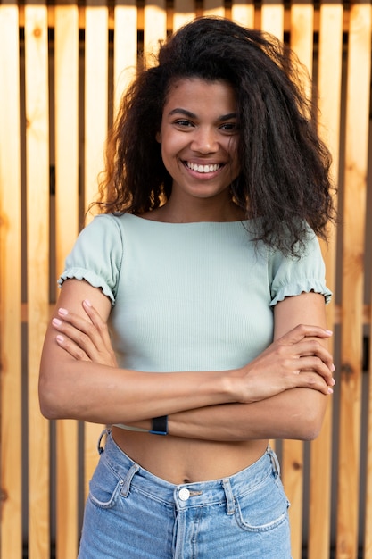 Free photo medium shot woman with crossed arms