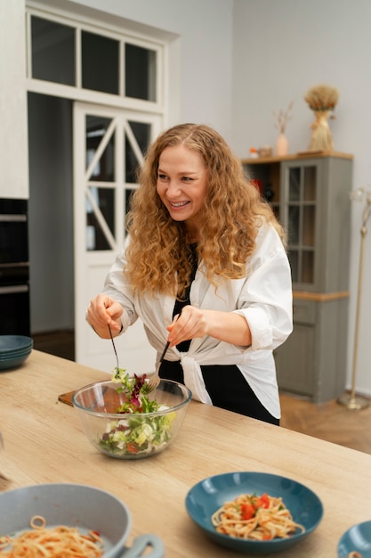 Medium shot woman with delicious food