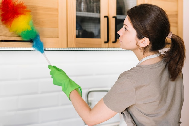 Medium shot woman with duster