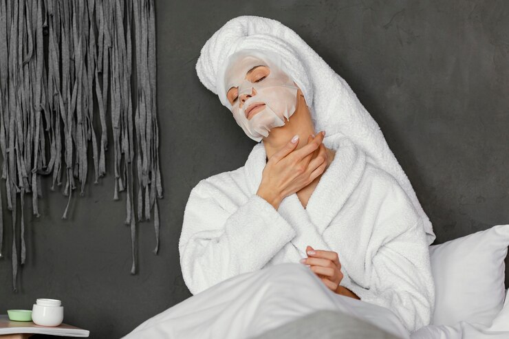 Free Photo medium shot woman with facial mask
