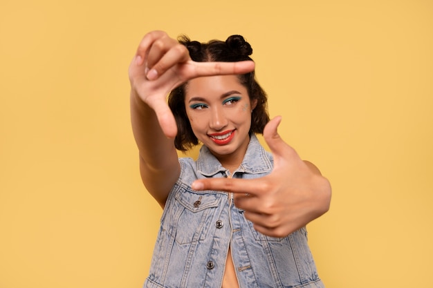 Medium shot woman with graphic eye makeup